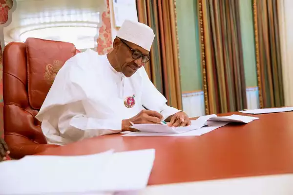 JUST IN: Buhari signs last bill for 2016 (PHOTOS)